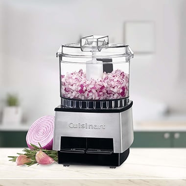 mini food processor chopping up onions